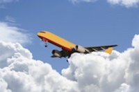 Plane Flying Through The Clouds